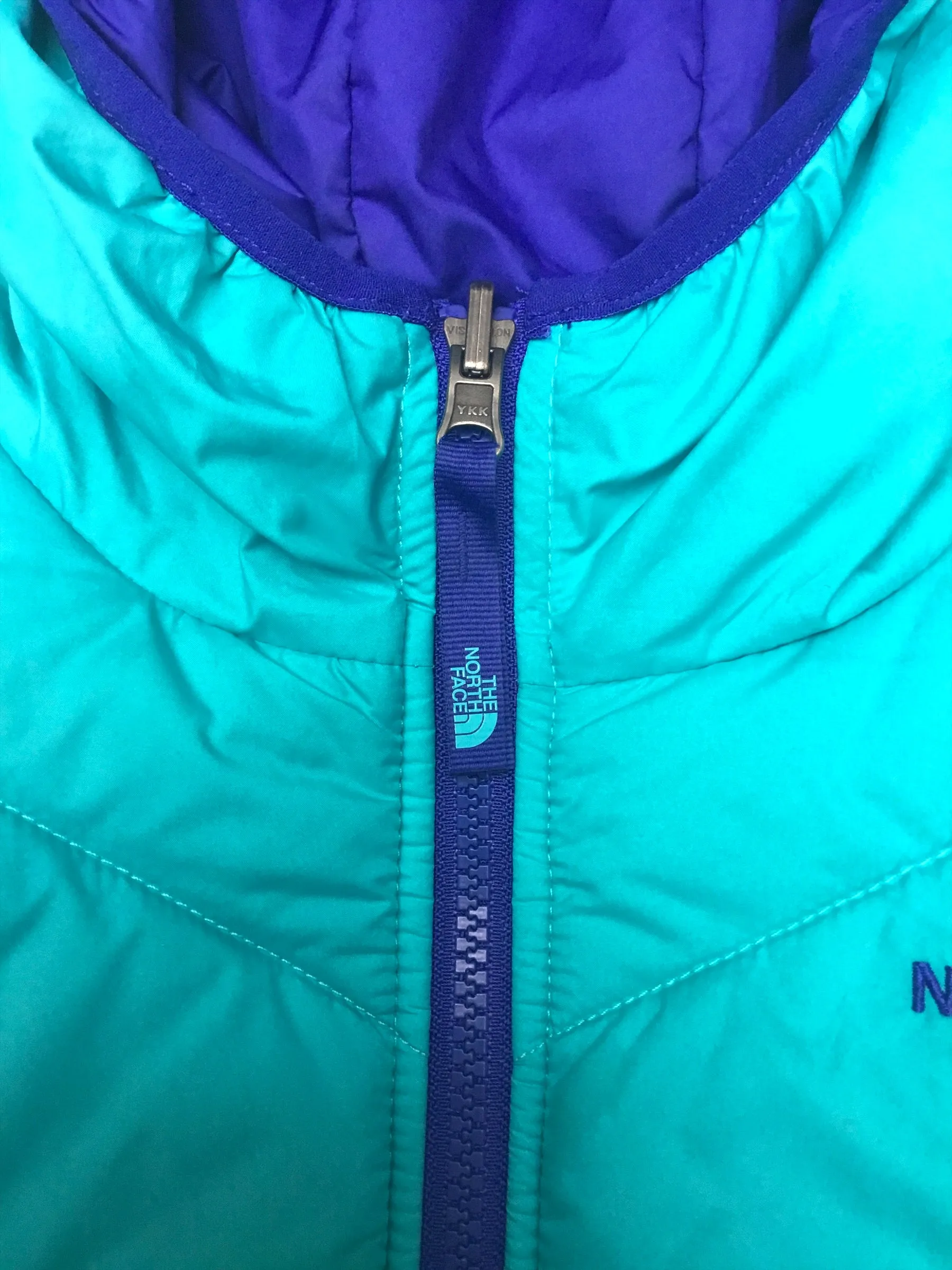 The North Face neon blue reversible hooded puffer jacket