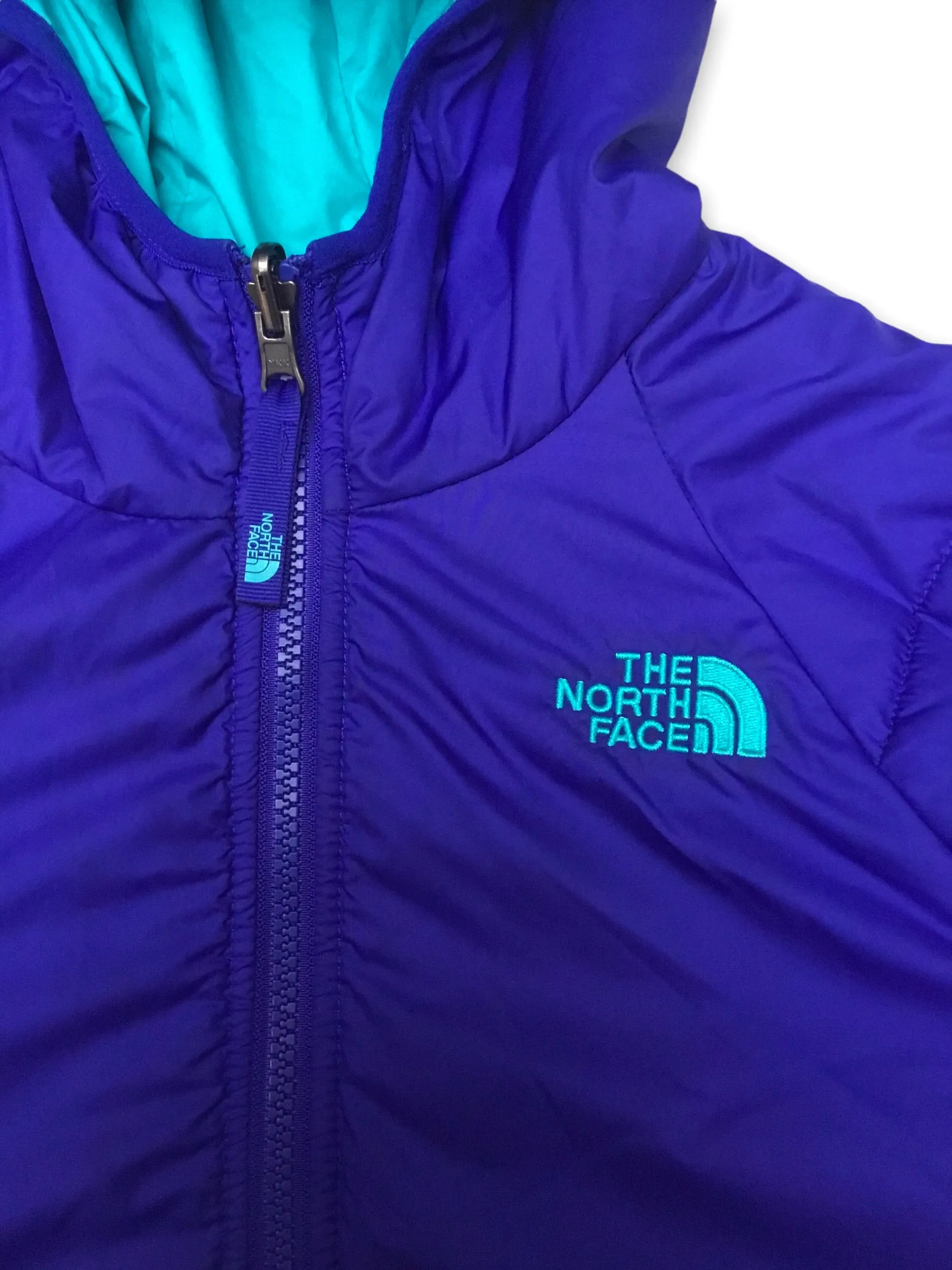 The North Face neon blue reversible hooded puffer jacket